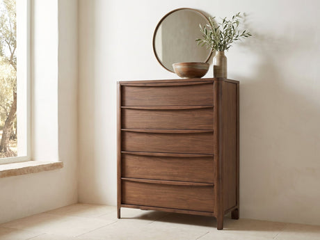 Montagnana 40-Inch Walnut 5-Drawer Chest under a round bronze mirror in a villa bedroom
