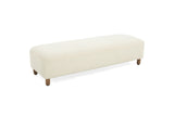 Montalto 60-Inch Ivory Sherpa Upholstered Bench Ottoman on a white background