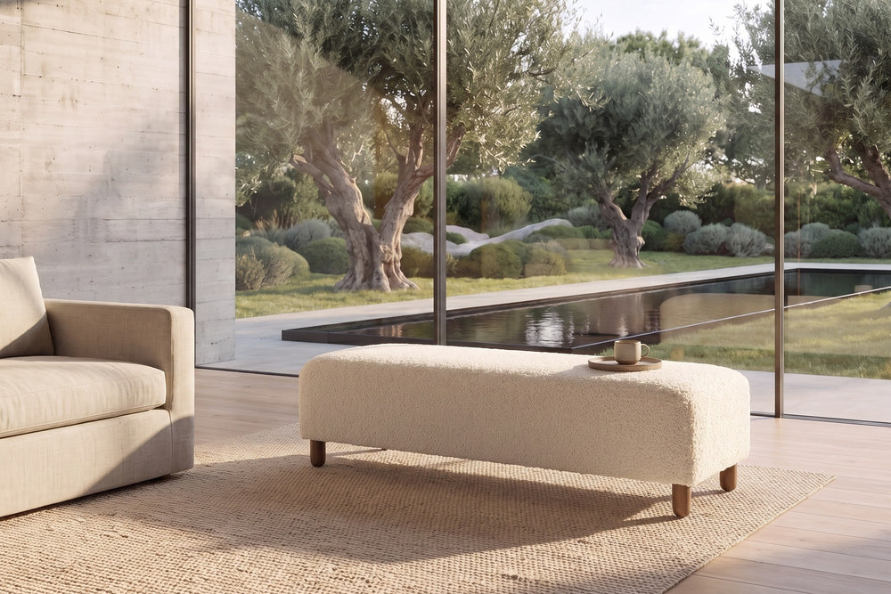 Montalto 60-Inch Ivory Sherpa Upholstered Bench Ottoman in a living room
