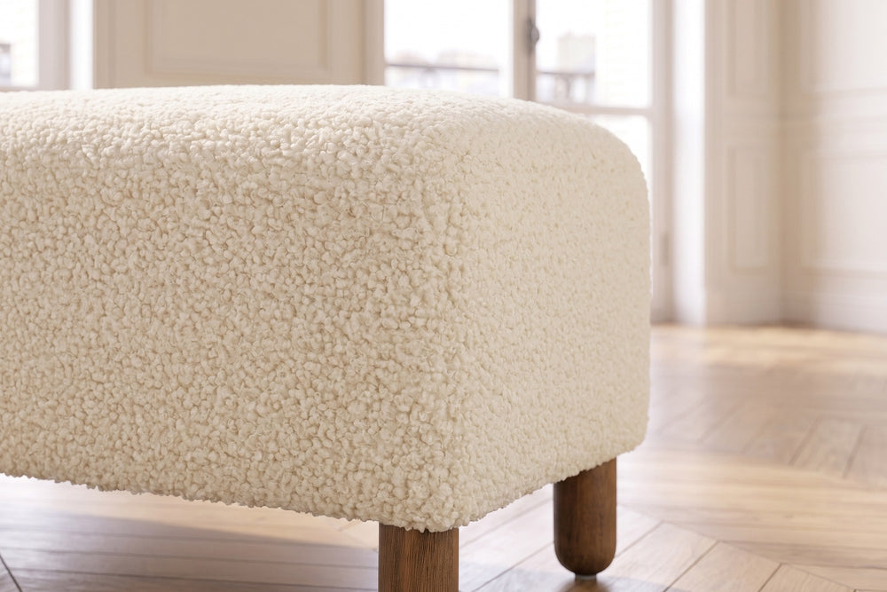 Close-up of the Montalto 60-Inch Ivory Sherpa Upholstered Bench Ottoman: sherpa