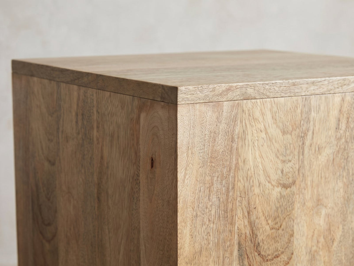 Close-up of the Montecatini Square Mango Side Table: the square top edge over the vertical mango planks
