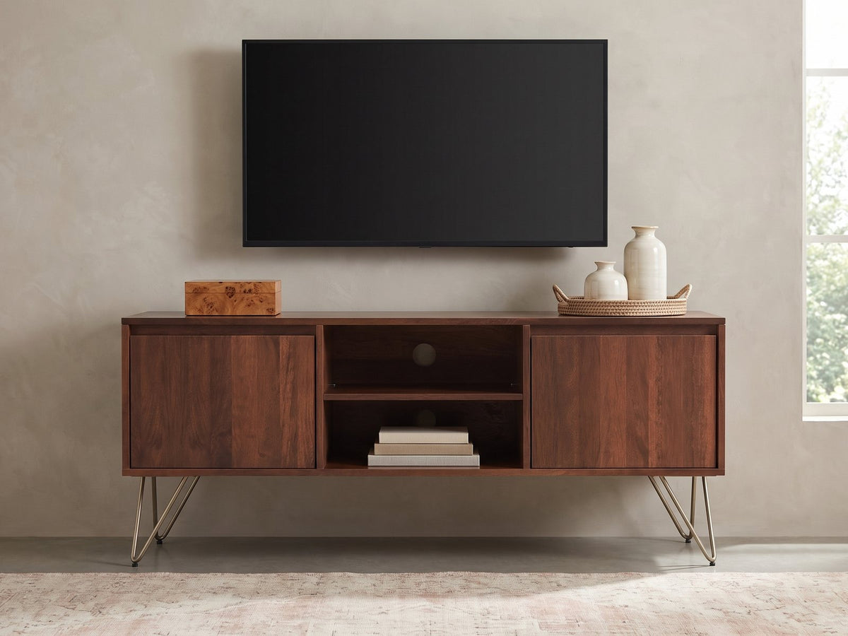 Montefalco Solid Mango Media Console styled with a box, a tray of vases and books under a wall-mounted screen