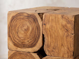 Close-up of the Montefiore Teak Root Cube Side Table: the end-grain growth rings of the teak root blocks