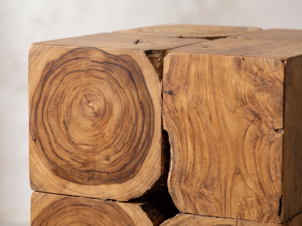 Close-up of the Montefiore Teak Root Cube Side Table: the end-grain growth rings of the teak root blocks