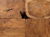 Close-up of the Montefiore Teak Root Cube Side Table: the teak root figure of the top