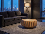 Montepulciano Fluted Ash Coffee Table on a wool rug in front of a velvet sofa in a city penthouse at blue hour