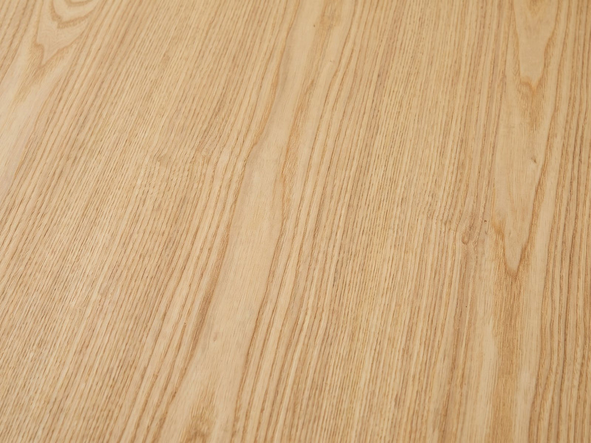 Close-up of the Montepulciano Fluted Ash Coffee Table: the pale ash grain of the top