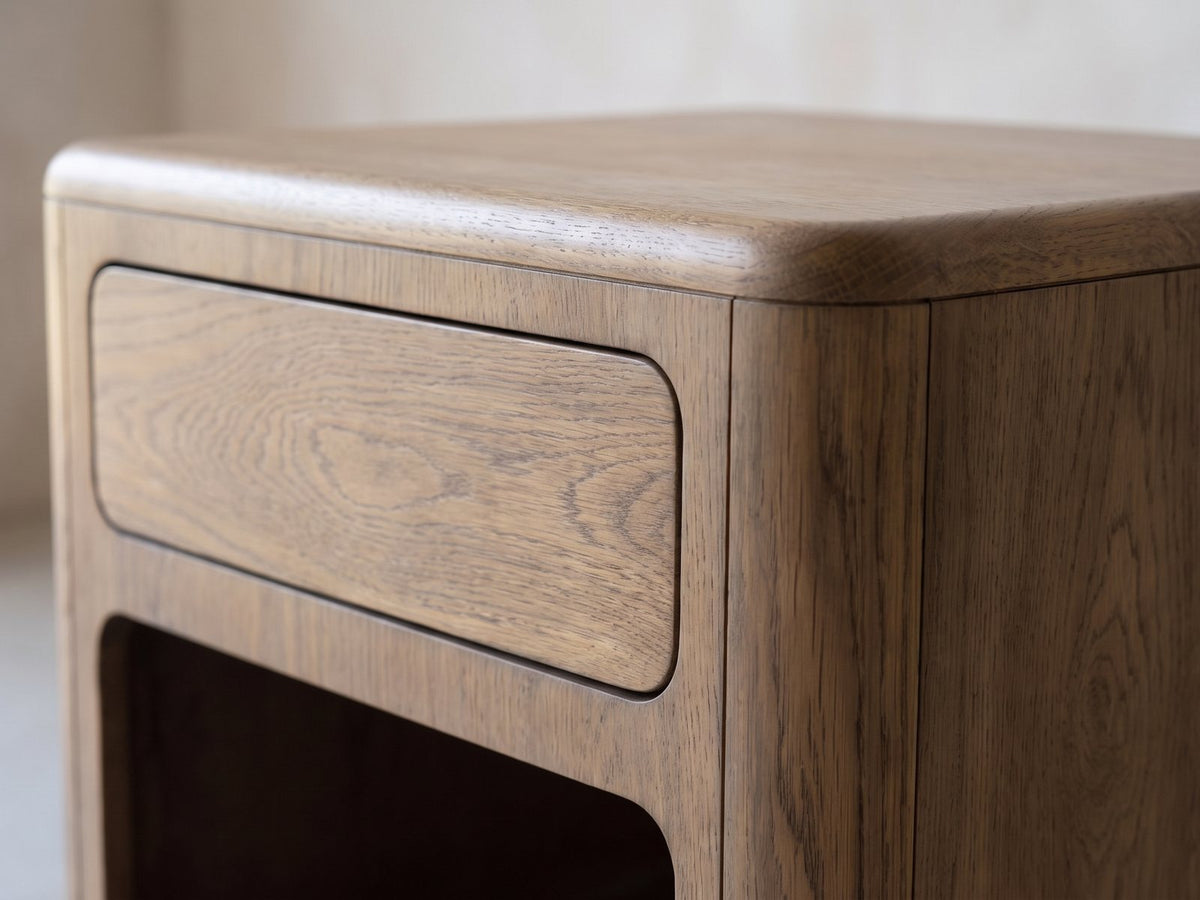 Close-up of the Monticchiello Driftwood Oak Veneer Cube Side Table: the rounded top edge, the push-open drawer and the open niche