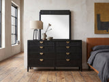 Murano 66-Inch Black Oak 8-Drawer Dresser with Mirror against a plaster wall in an industrial loft bedroom
