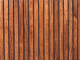 Close-up of the Noale 28-Inch Honey Caramel Solid Mango 3-Drawer Chest: the vertical mango ribs of a drawer front