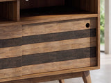 Close-up of the Offida Two-Tone Acacia Media Console: the open shelf beside the sliding door with its cable opening