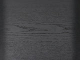 Close-up of the Oppido Black Ash Veneer Waterfall Side Table: the open grain of the matte black ash veneer