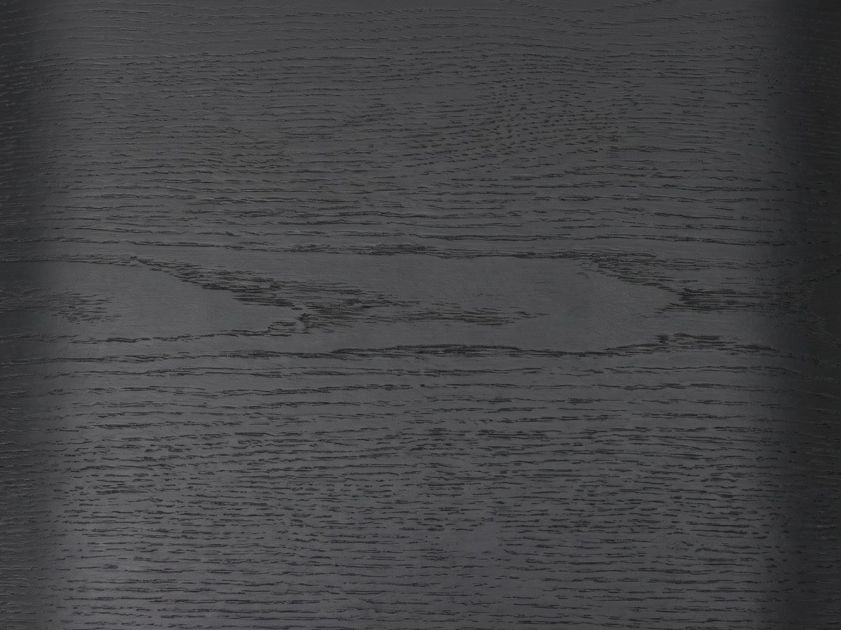 Close-up of the Oppido Black Ash Veneer Waterfall Side Table: the open grain of the matte black ash veneer