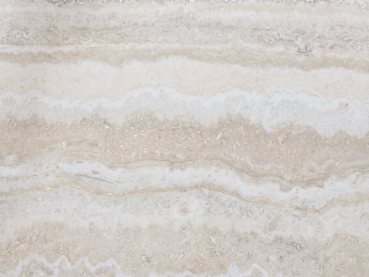 Close-up of the Orbetello Faux Travertine Oval Arch Coffee Table: the honed travertine-look veining of the oval top