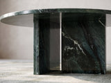 Close-up of the Orosei Verde Marble Coffee Table: the two green marble slabs of the base meeting under the top