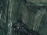 Close-up of the Orosei Verde Marble Coffee Table: the veining of the polished green marble top