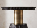 Close-up of the Orsomarso Carved Black Mango Pedestal Side Table: the carved tray edge over the antique-gold metal stem