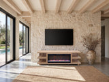 Ortisei Oak Fireplace Media Console under a screen on a pale stone wall in a poolside villa