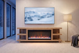 Ortisei Oak Fireplace Media Console with the fire lit under a screen on a winter evening