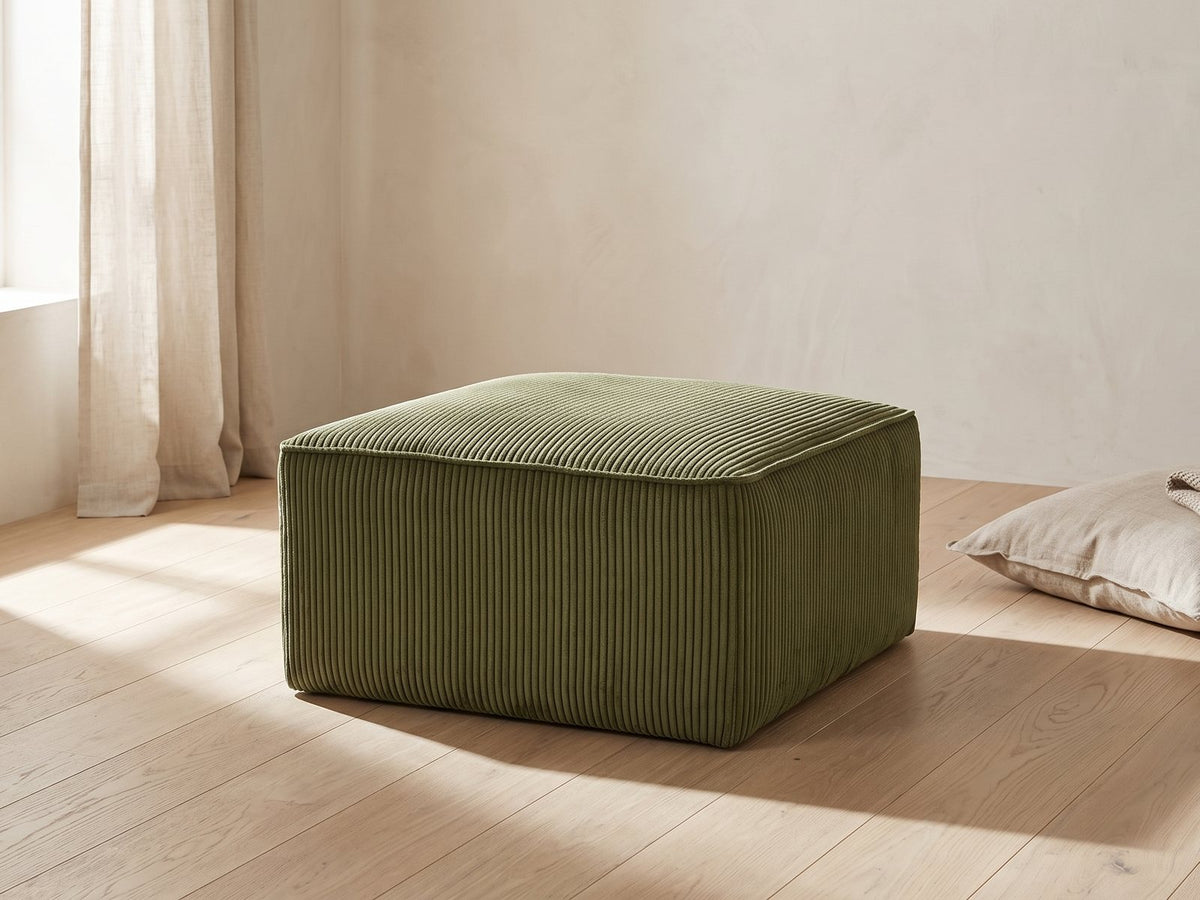 The Orvieto cocktail ottoman styled in a room setting