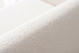 Close-up of the white boucle on the smooth rounded top edge of a Pacentro bed rail