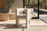 Palermiti Three-Leg Boucle Dining Chair in a sunlit villa dining room