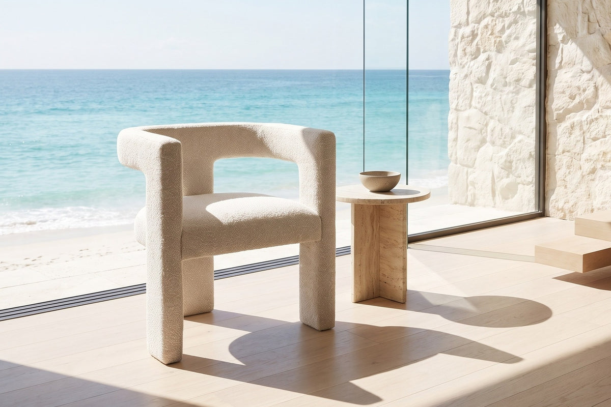 Palermiti Three-Leg Boucle Dining Chair in an oceanfront glass house