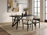 Palmi 70-Inch Black Oak Veneer Dining Set with 4 Boucle Chairs in an industrial loft dining area