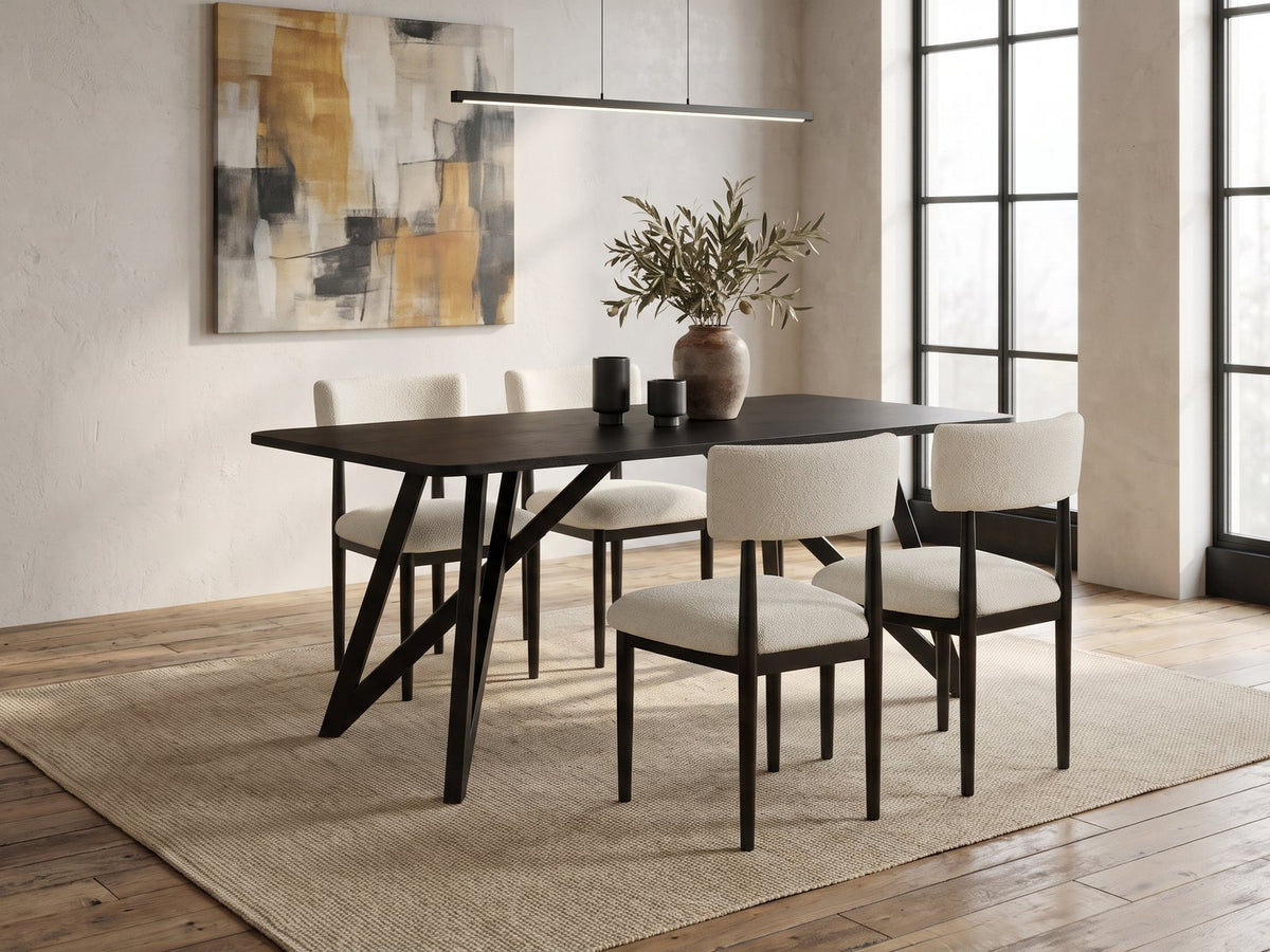 Palmi 70-Inch Black Oak Veneer Dining Set with 4 Boucle Chairs in an industrial loft dining area