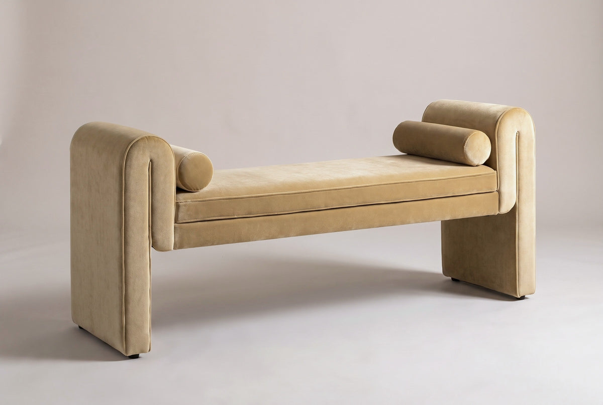 The Panicale bench in camel velvet, three-quarter view on a light studio backdrop
