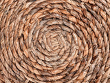 Close-up of the Parabita Woven Natural Fiber Barrel Side Table: the spiral of twisted natural fiber on the top