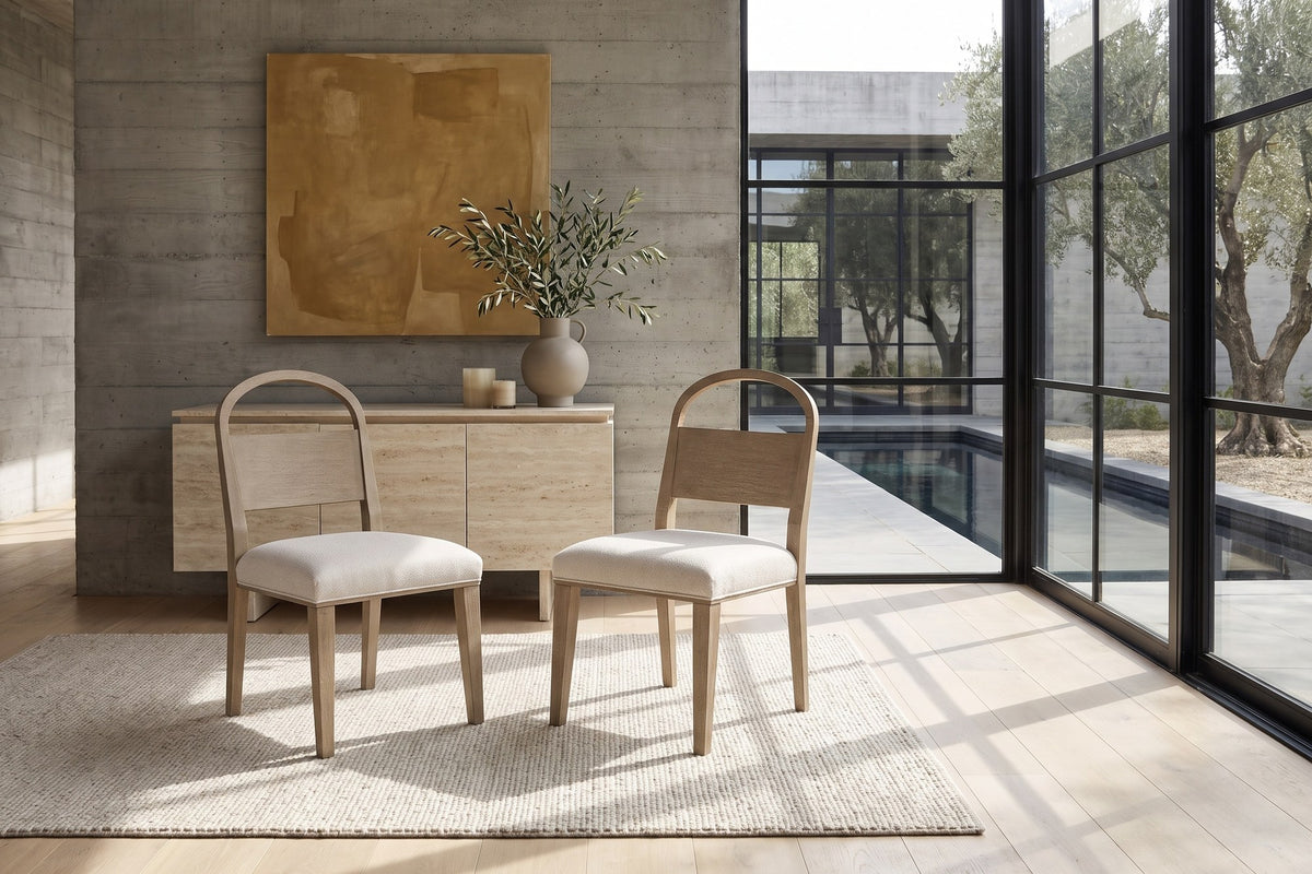 Parghelia Arch-Back Upholstered Wood Dining Chair (Set of 2) in a sunlit villa dining room