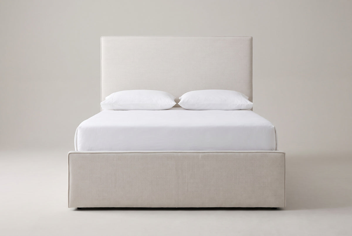 Penne ivory canvas bed with a white mattress and pillows (not included), front view