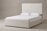 The Penne ivory canvas bed with a tall rectangular headboard, a welted footboard, a white mattress and pillows (not included), three-quarter view on a light studio backdrop