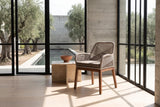 Pentone Woven Rope and Mahogany Dining Arm Chair in a sunlit villa dining room