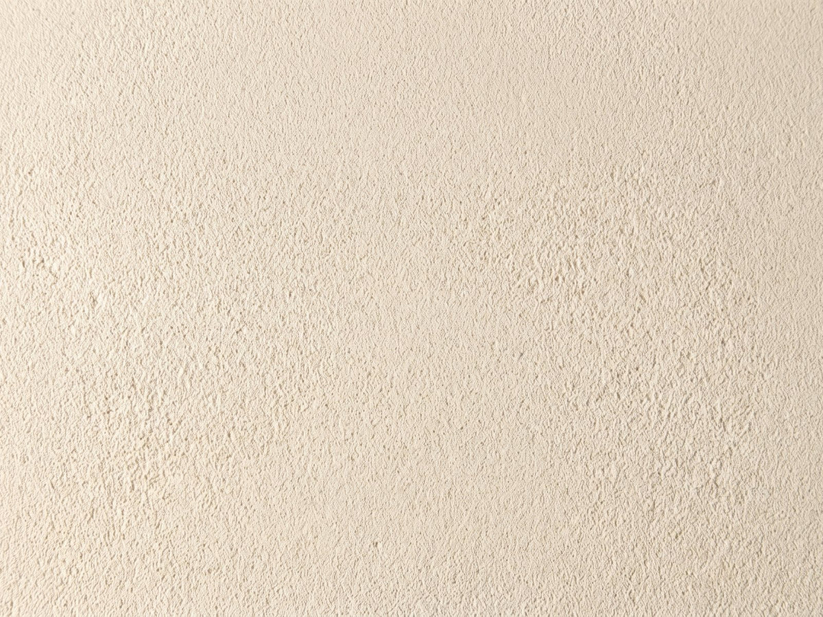 Close-up of the Pescocostanzo Cream Textured Fiberglass Mushroom Side Table: the sand-textured matte finish