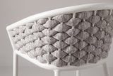 Close-up of the grey-and-white woven rope back of a Petralia stool and its white aluminum top band