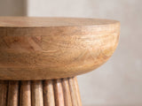 Close-up of the Petroio Fluted Mango Mushroom Side Table: the rounded mango cap over the fluted base