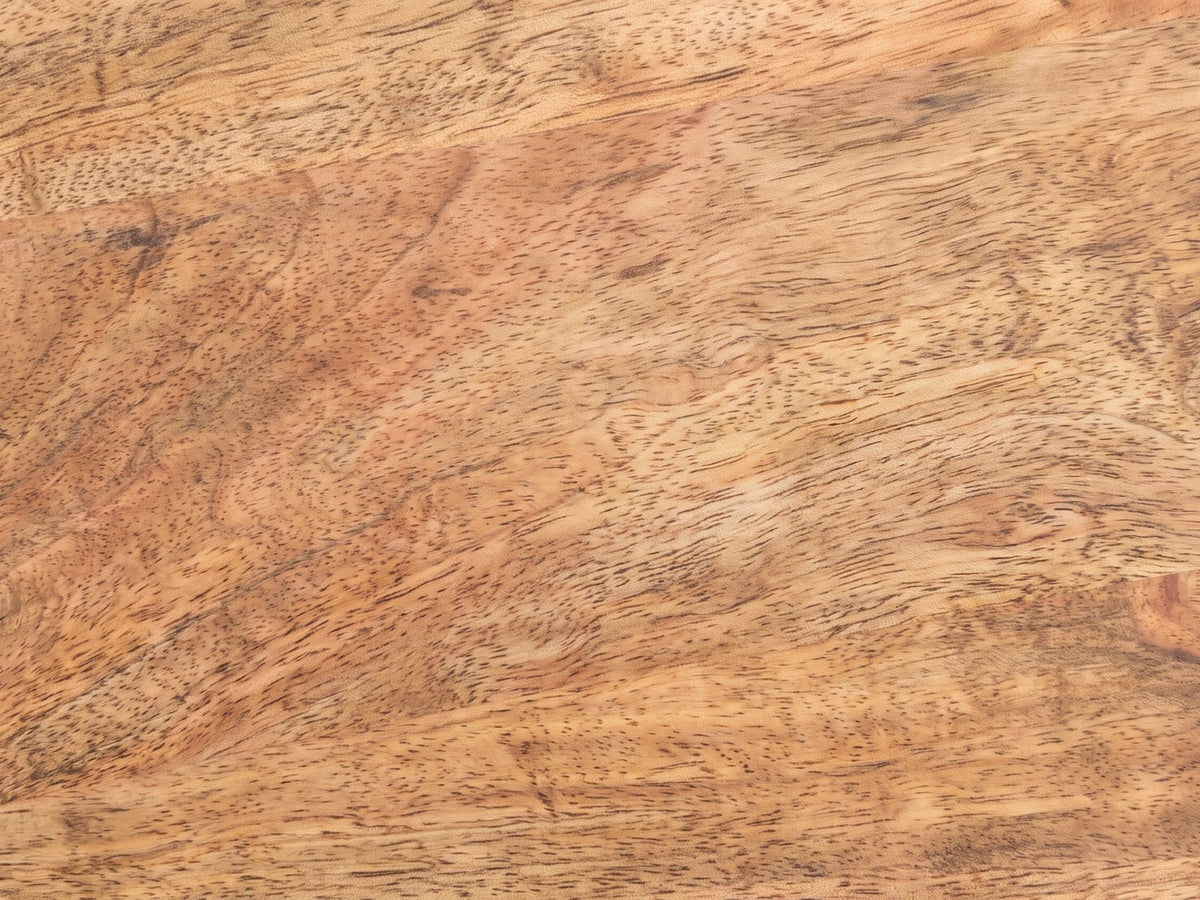 Close-up of the Petroio Fluted Mango Mushroom Side Table: the natural mango grain of the round top
