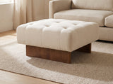 Pienza Tufted Ottoman in a sunlit room