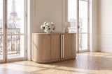 Pietrafitta 54-Inch 4-Door Rounded Oak Veneer Server with Stone Pulls in a Paris salon