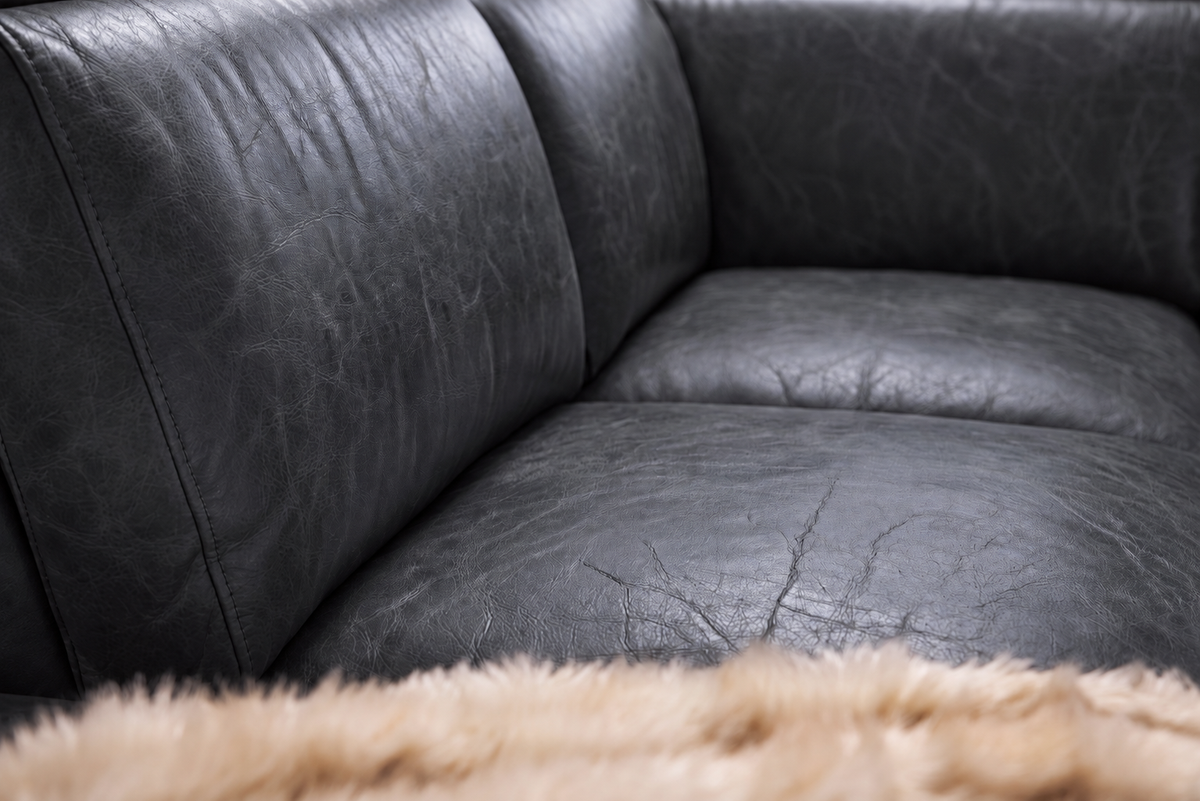 Valencia Pista Distressed Leather Reclining Sofa
