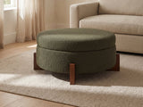 Portofino Round Storage Ottoman in a sunlit room