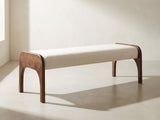 Positano Arch Bench in ivory against a plaster wall in morning light