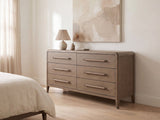 Possagno 54-Inch Latte Elm 6-Drawer Dresser against a plaster wall under an abstract canvas in a bright bedroom
