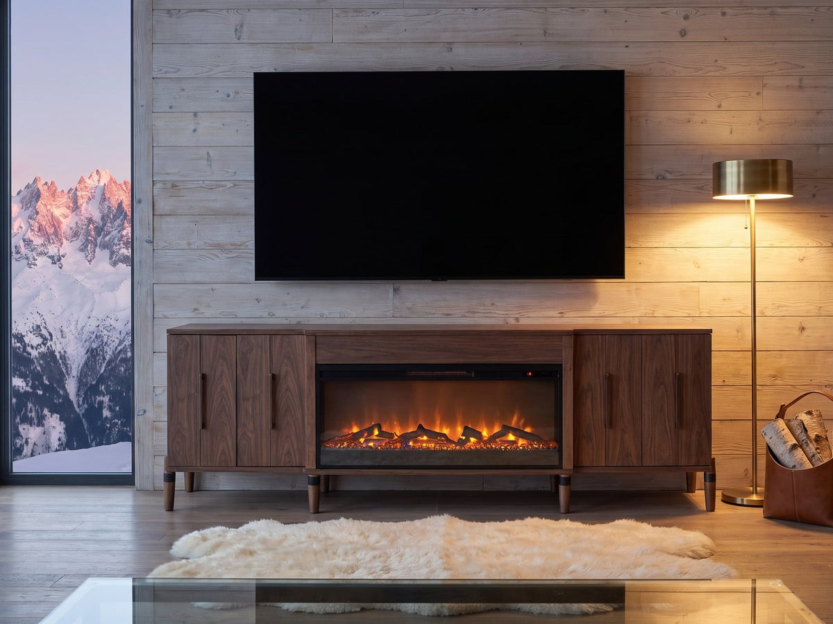 Praiano Walnut Fireplace Media Console under a wall-mounted screen in an alpine chalet at dusk