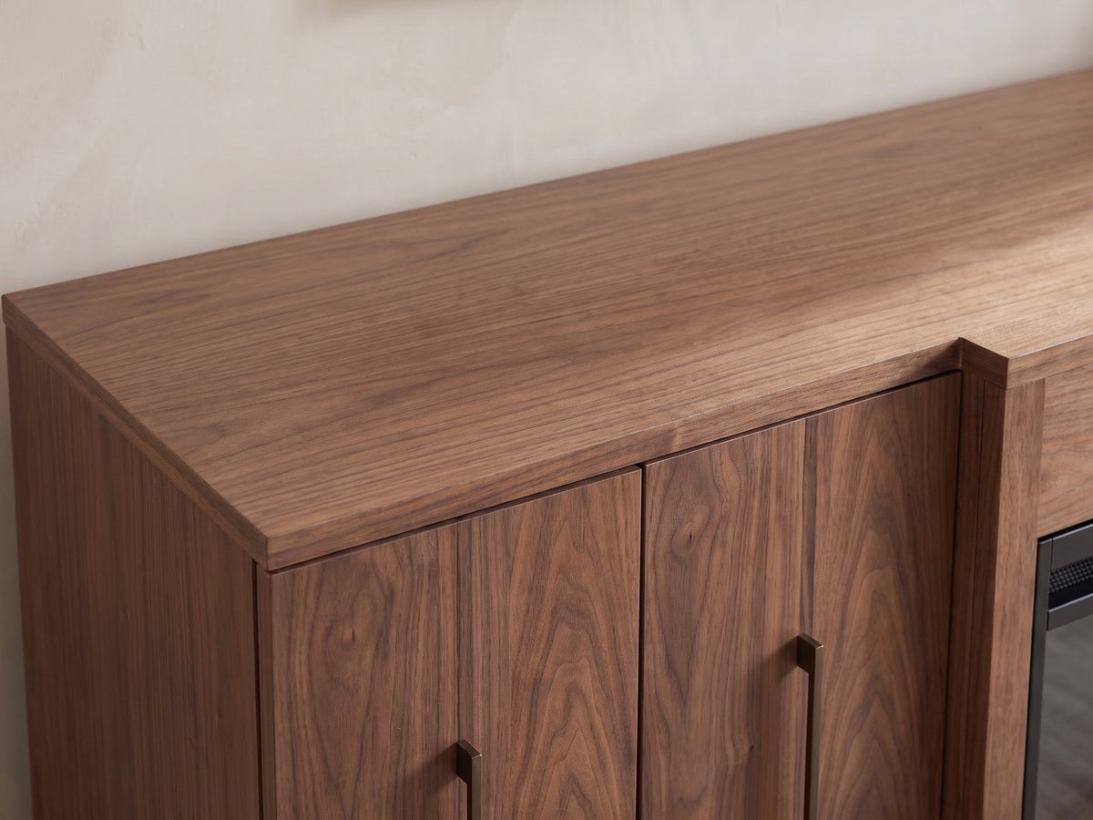 Close-up of the Praiano Walnut Fireplace Media Console: the walnut veneer top surface