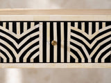 Close-up of the Pulsano Bone Inlay Oval Console Table: the bone inlay of the drawer front around its small brass-tone knob