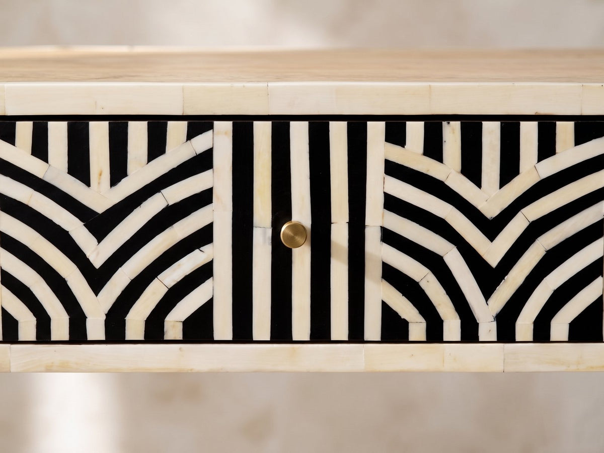 Close-up of the Pulsano Bone Inlay Oval Console Table: the bone inlay of the drawer front around its small brass-tone knob
