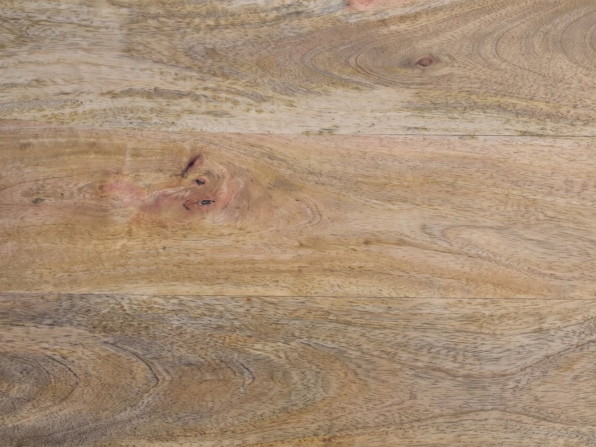 Close-up of the Pulsano Bone Inlay Oval Console Table: the natural grain of the solid mango top